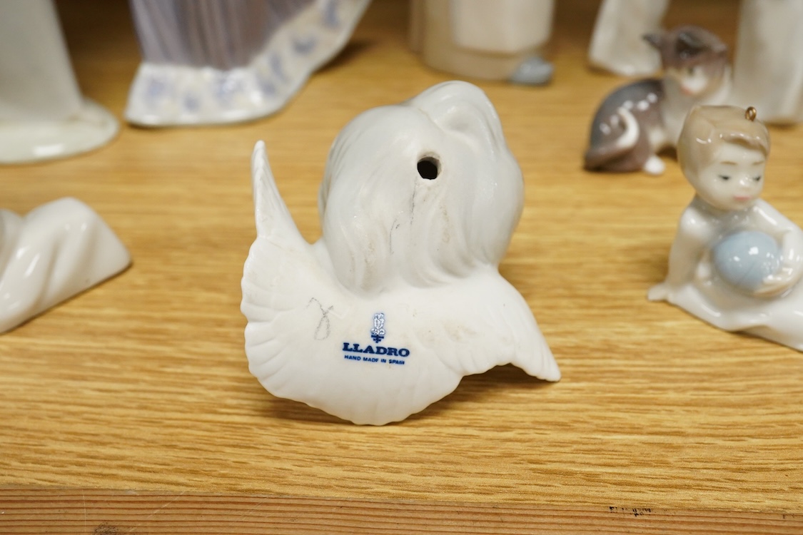 A group of twelve Lladro figures/animals, tallest 23cm